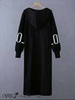Black hooded knit coat, long straight back with geometric sleeve cutouts, front zipper