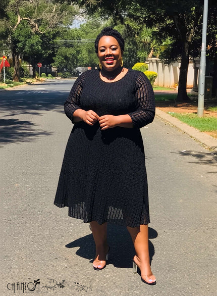 Black textured sheer midi dress with 3/4 sleeves, round neck, flared skirt