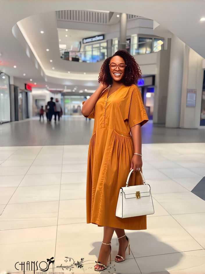 Women’s mustard V-neck midi dress with half-button front and side pockets