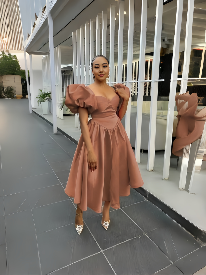 Peach puff-sleeve midi dress with square neckline, gathered waist, flared skirt