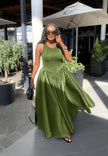 Light-green sleeveless maxi dress with fitted bodice and gathered skirt