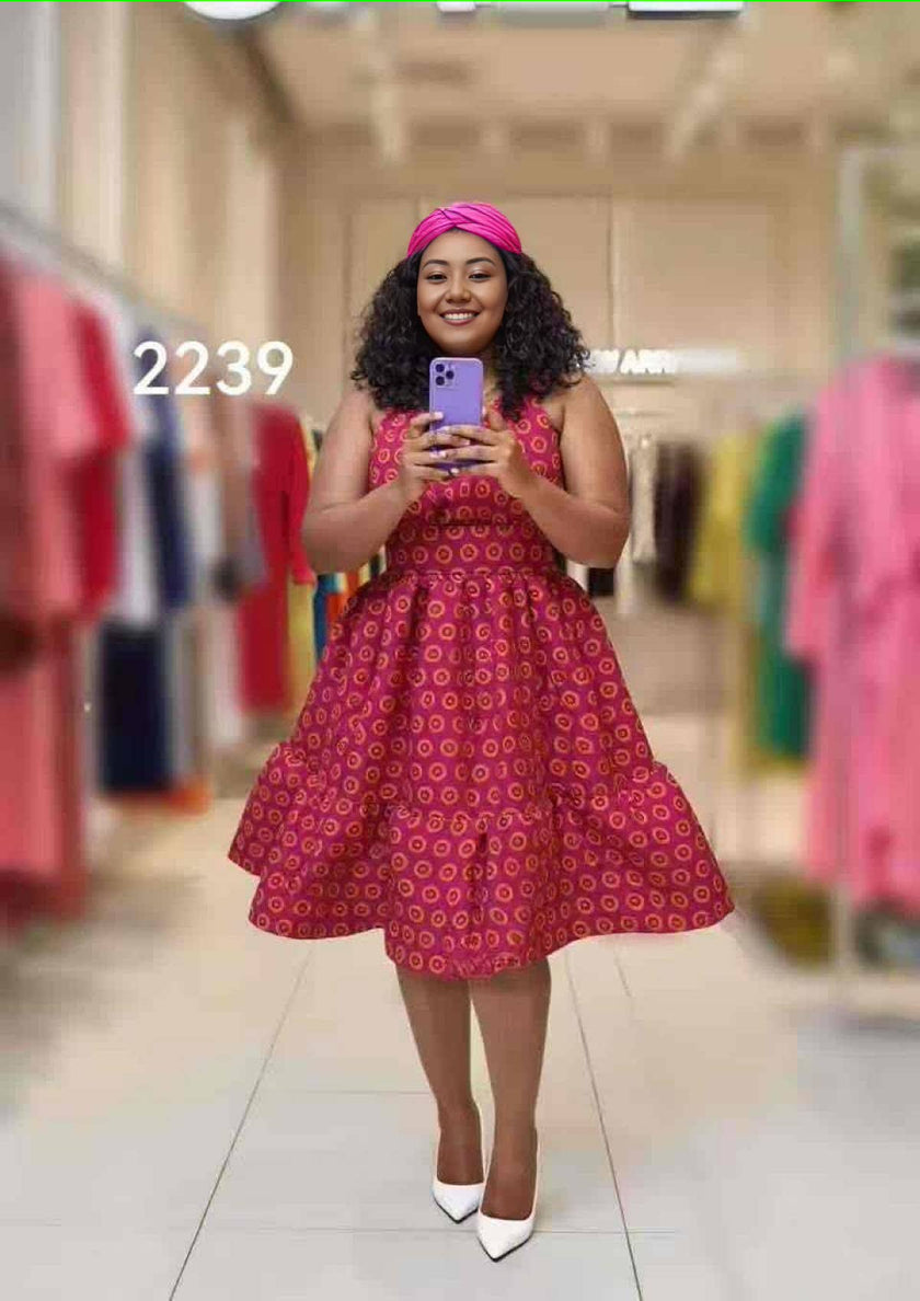 Printed sleeveless tiered A-line midi dress, red with circular pattern