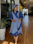 Blue striped wrap dress with puff sleeves and ruffle hem, knee length