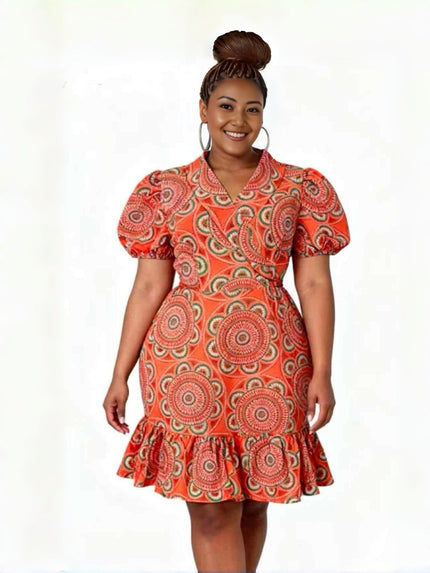 Orange wrap dress with puff sleeves and ruffled hem, patterned with circular motifs.