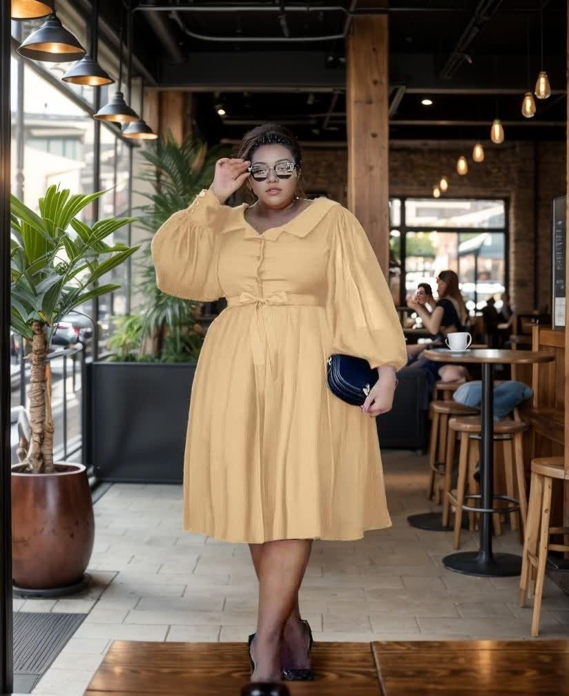 Nude midi dress with puff sleeves and gathered waist, flared skirt