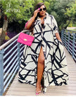Plus size geometric A-line shirt dress, black and white abstract print, button-front slit