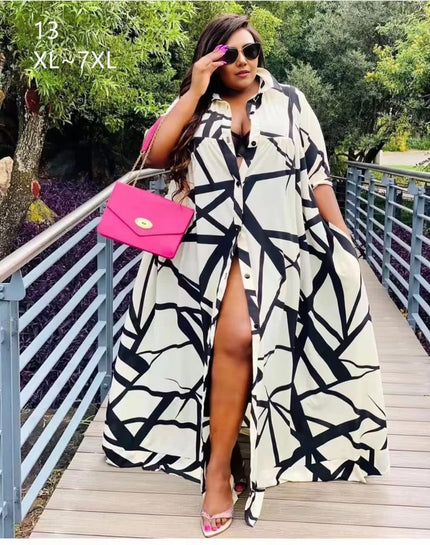 Plus size geometric A-line shirt dress, black and white abstract print, button-front slit