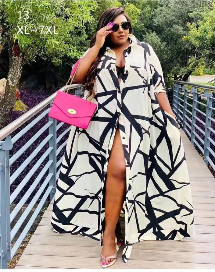 Plus size geometric A-line shirt dress, black and white abstract print, button-front slit