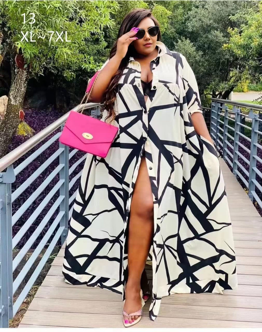 Plus size geometric A-line shirt dress, black and white abstract print, button-front slit