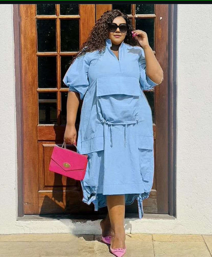 Plus-size midi dress in light blue with drawstring waist, loose fit, short sleeves, pockets