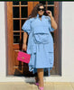 Plus-size midi dress in light blue with drawstring waist, loose fit, short sleeves, pockets