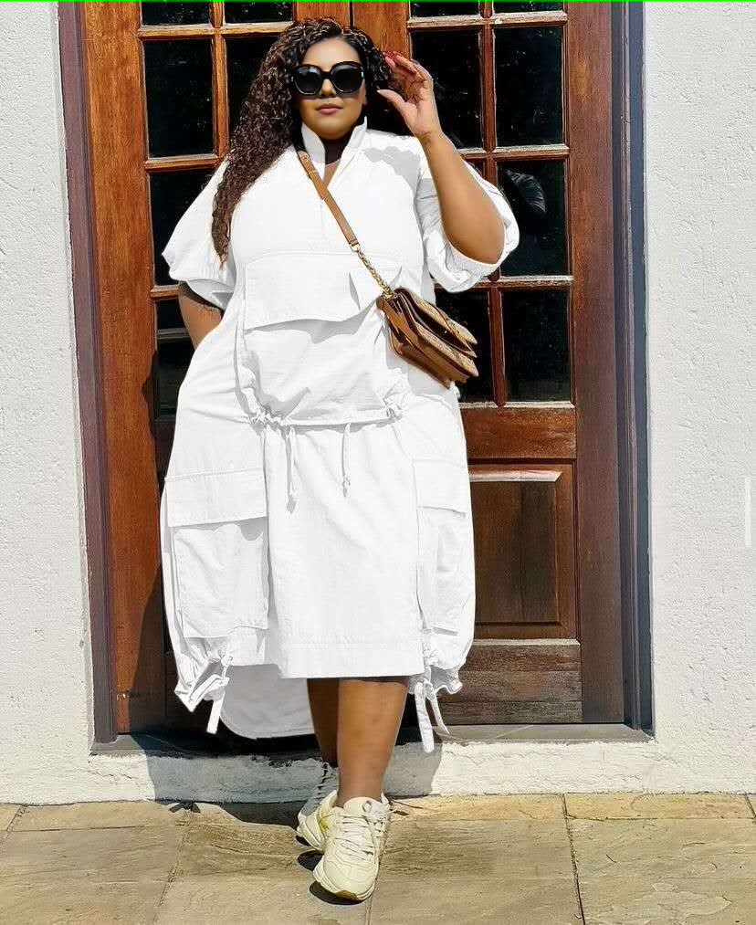 Plus-size midi dress in white with drawstring waist, loose fit, short sleeves, pockets