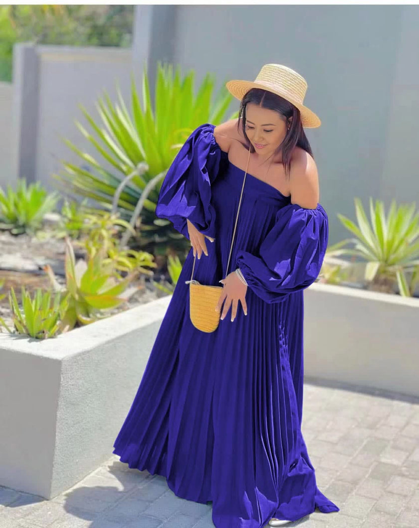 Blue off-shoulder maxi dress with pleated skirt and puff sleeves