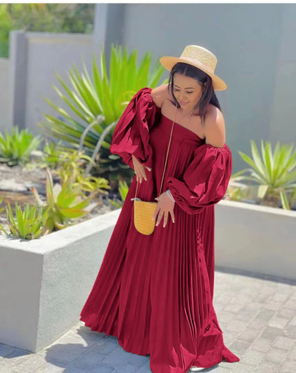 Red off-shoulder maxi dress with pleated skirt and puff sleeves