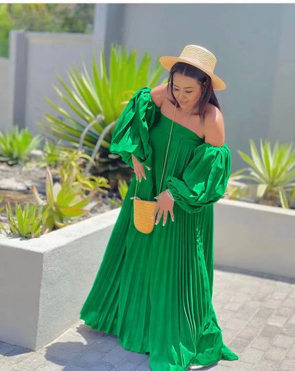 Green off-shoulder maxi dress with pleated skirt and puff sleeves