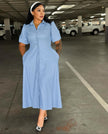 Sky-blue midi shirt dress with puff sleeves, button front, and waist detail