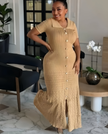 Tan knit midi dress with short sleeves, button front, and side slit detail.