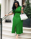 Lime-green belted knit midi dress with short sleeves, button front, and side slit.