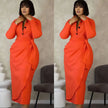 Orange-red midi dress with front twist, dark button placket, long sleeves