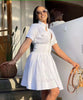 Women's Short Sleeve Zip-Up Dress with High Collar and Flared Hemline