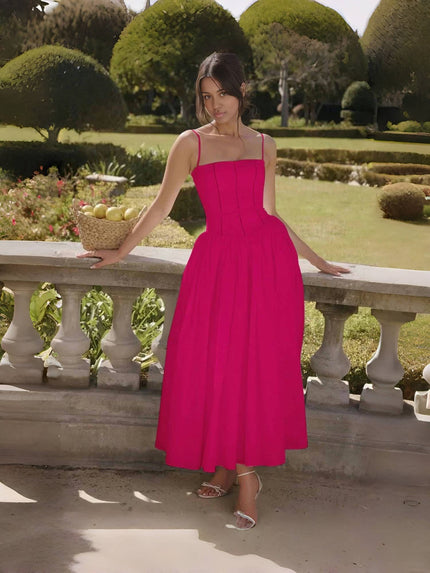 Deep-pink midi dress with thin straps, fitted bodice and flared skirt
