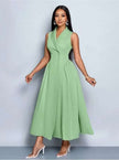 Sleeveless midi dress in mint green, V-neck with pleated A-line skirt