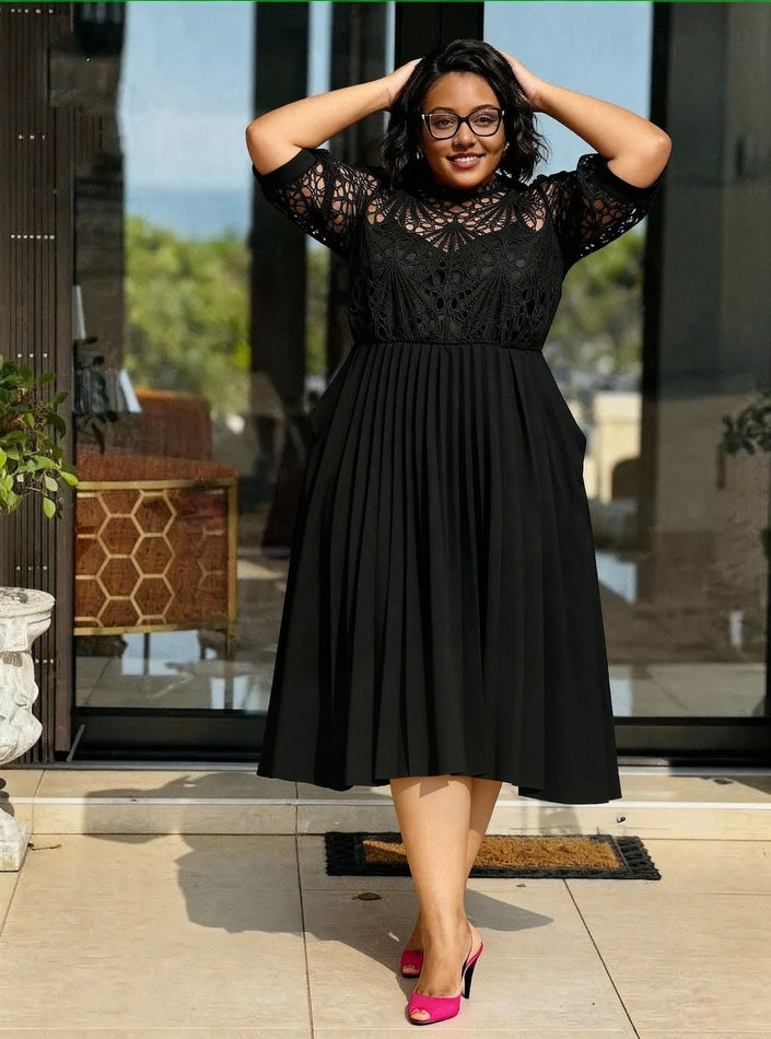 Black lace pleated midi dress with short flutter sleeves and scalloped neckline