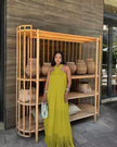 Green-yellow halter maxi dress with tassel fringe hem