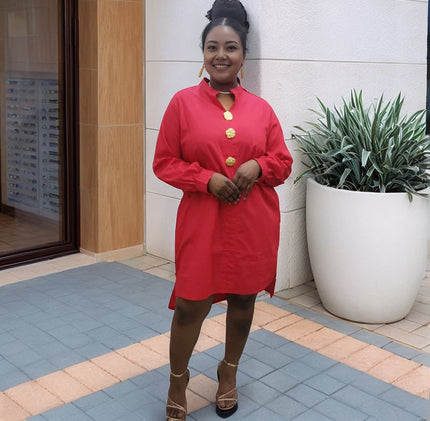 Red midi dress with five gold button placket and long sleeves