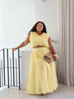 Yellow sleeveless crop top and flowy maxi skirt two-piece set with elastic waist