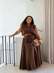 Brown sleeveless crop top and flowy maxi skirt two-piece set, elastic waist