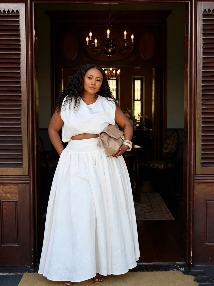 White sleeveless crop top and gathered maxi skirt two-piece set