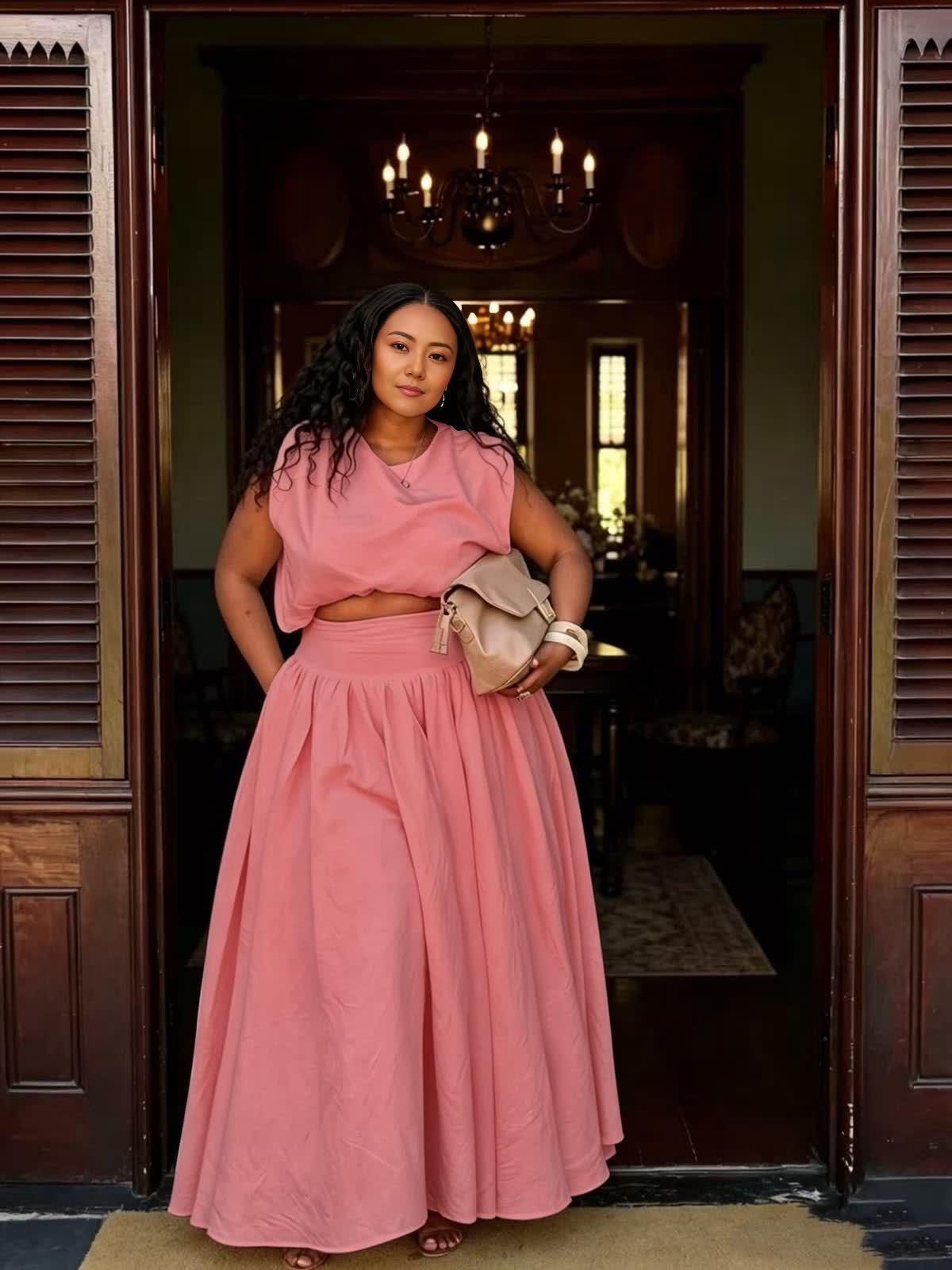 Pink sleeveless crop top and gathered maxi skirt two-piece set