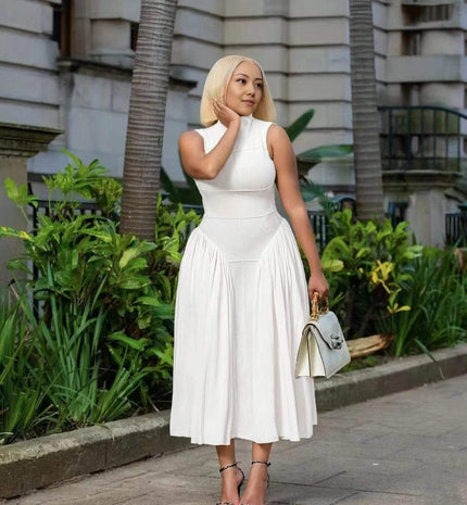 White pleated midi A-line dress with sleeveless fitted bodice and gathered skirt