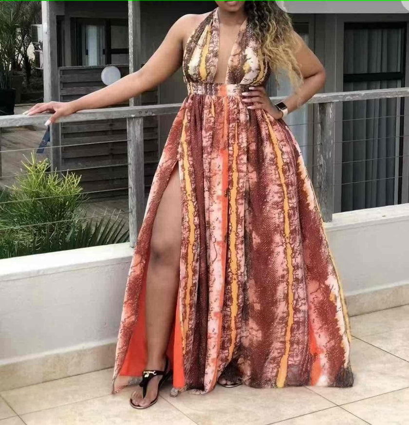 Pleated halter maxi dress with multicolor vertical stripes, open front slit and high-low hem