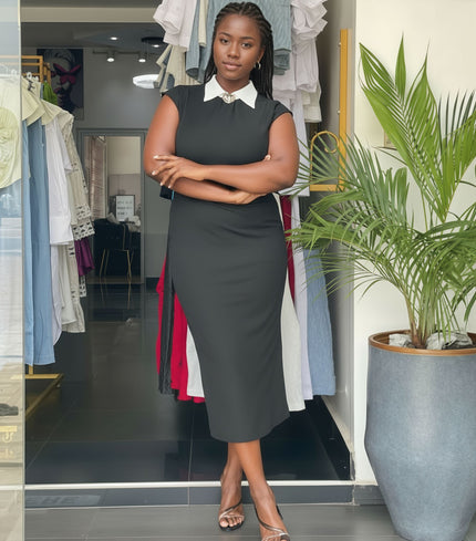 Sleeveless midi dress, dark with contrast white collar and tailored fitted waist