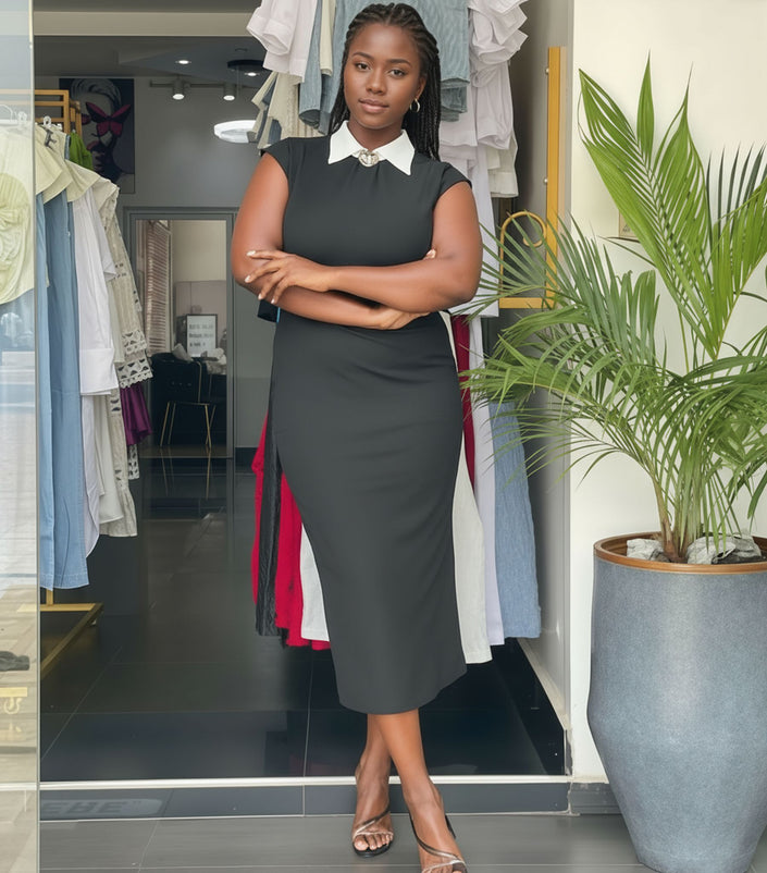 Sleeveless midi dress, dark with contrast white collar and tailored fitted waist