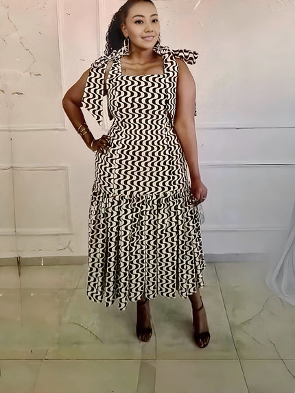 Sleeveless ruffle midi dress with wavy black-and-white pattern and high neckline