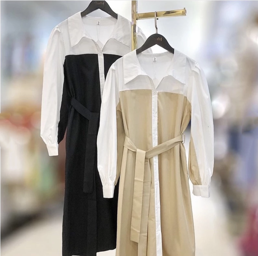 Pair of patchwork midi shirt dresses on hangers, black-and-cream and beige-and-white