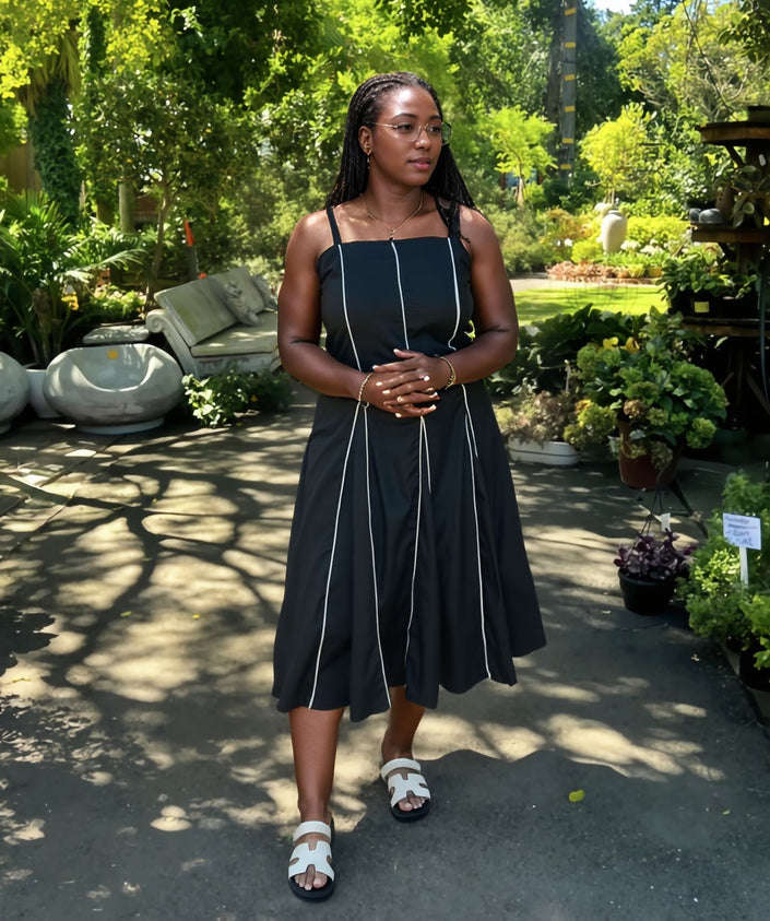 - Sleeveless A-Line Dress with Vertical Piping