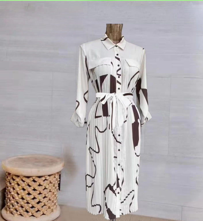 Midi shirt dress with abstract black print, button front, collar, long sleeves, waist tie