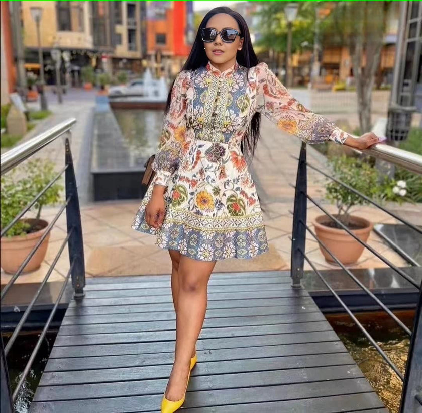 Floral paisley mini dress with long puff sleeves, multicolor print, fitted waist and skirt hem