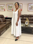 White sleeveless A-line maxi dress with black-trim vertical seam detail