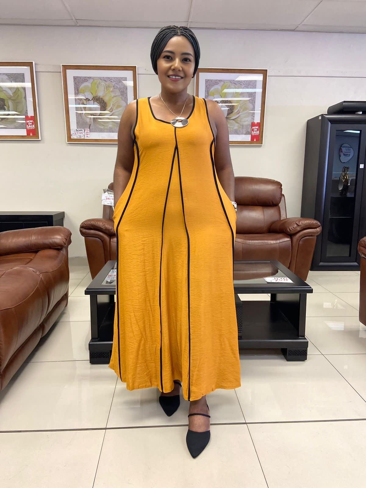 Sleeveless A-line maxi dress, goldenrod with black-trim neckline and pockets