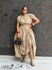 Nude ruched maxi skirt with gathered waist and draped, side-slit hem