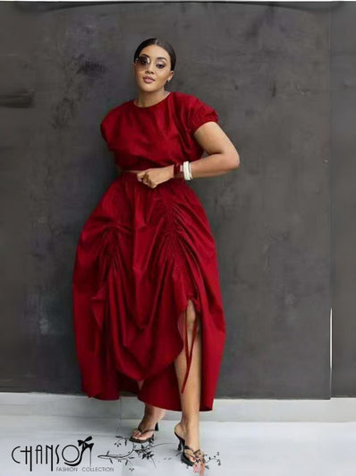 Red ruched maxi skirt with adjustable fit, gathered waist and flowing drape