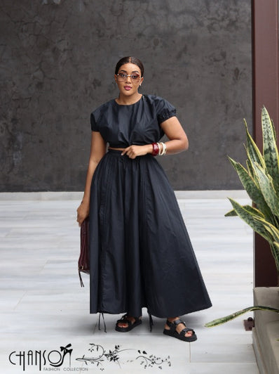Black ruched maxi skirt with adjustable waist, full skirt and subtle side slit