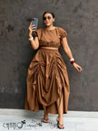 Brown ruched maxi skirt with gathered waist and draped side-slit hem