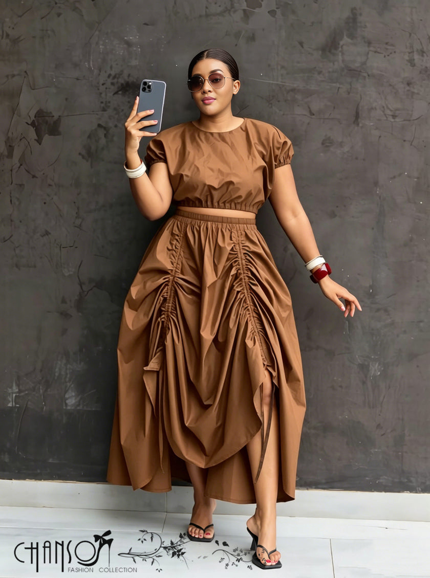 Brown ruched maxi skirt with gathered waist and draped side-slit hem