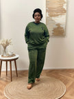 Olive green two-piece jogger set with crew sweatshirt and tapered pants, small chest emblem